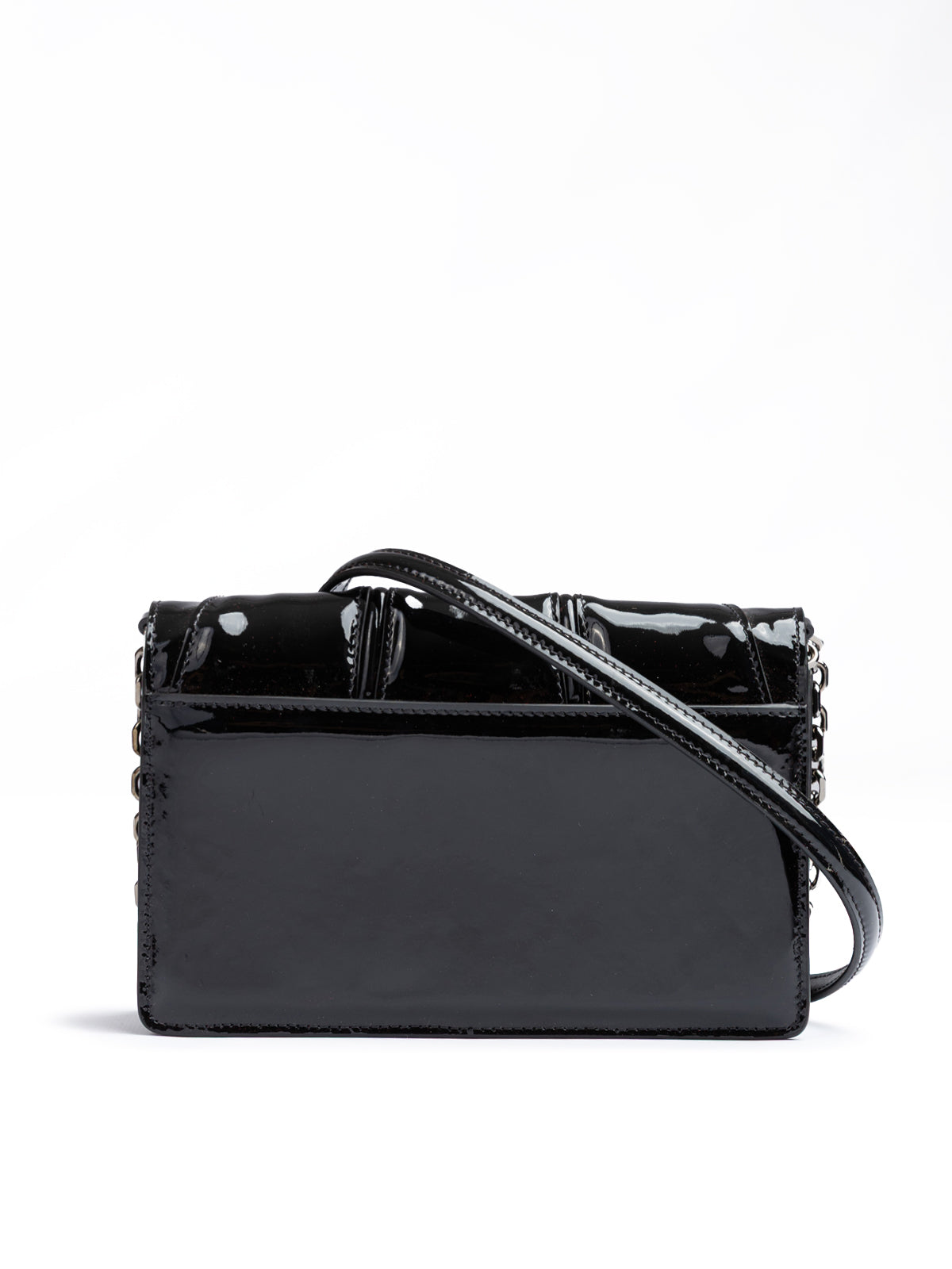 Black handbag with a strap on a white background