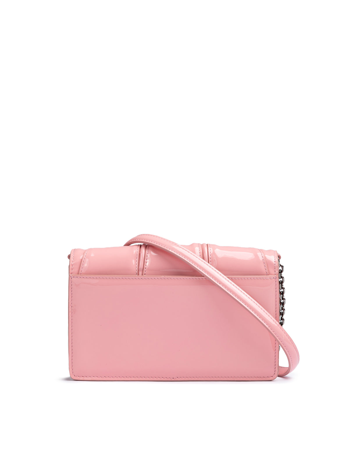Pink handbag with a shoulder strap on a white background