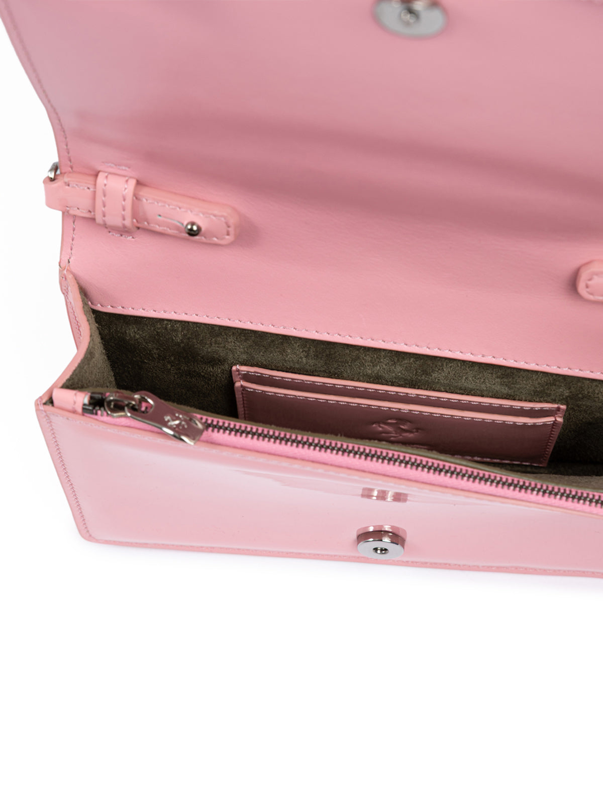 Pink handbag with open flap showing interior on a white background