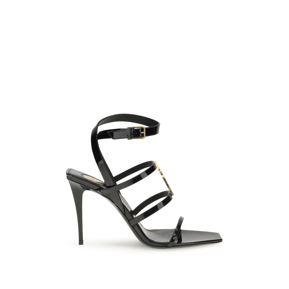Black strappy high-heeled sandal on a white background