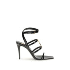 Black strappy high-heeled sandal on a white background