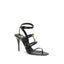 Black high-heeled sandal with gold accents on a white background