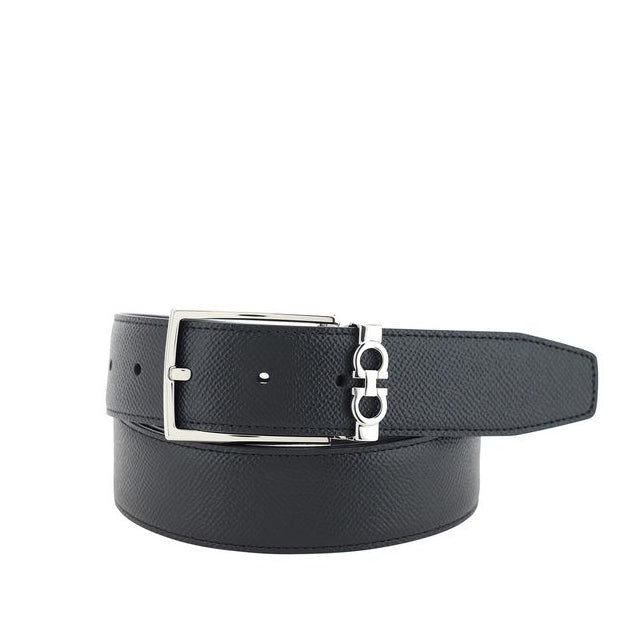 Black leather belt with silver buckle on a white background