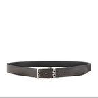 Black belt with silver buckle on a white background