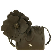 An olive green leather handbag with a large sculptural flower applique on the front and a small gold logo on the lower right, shown against a plain white background.