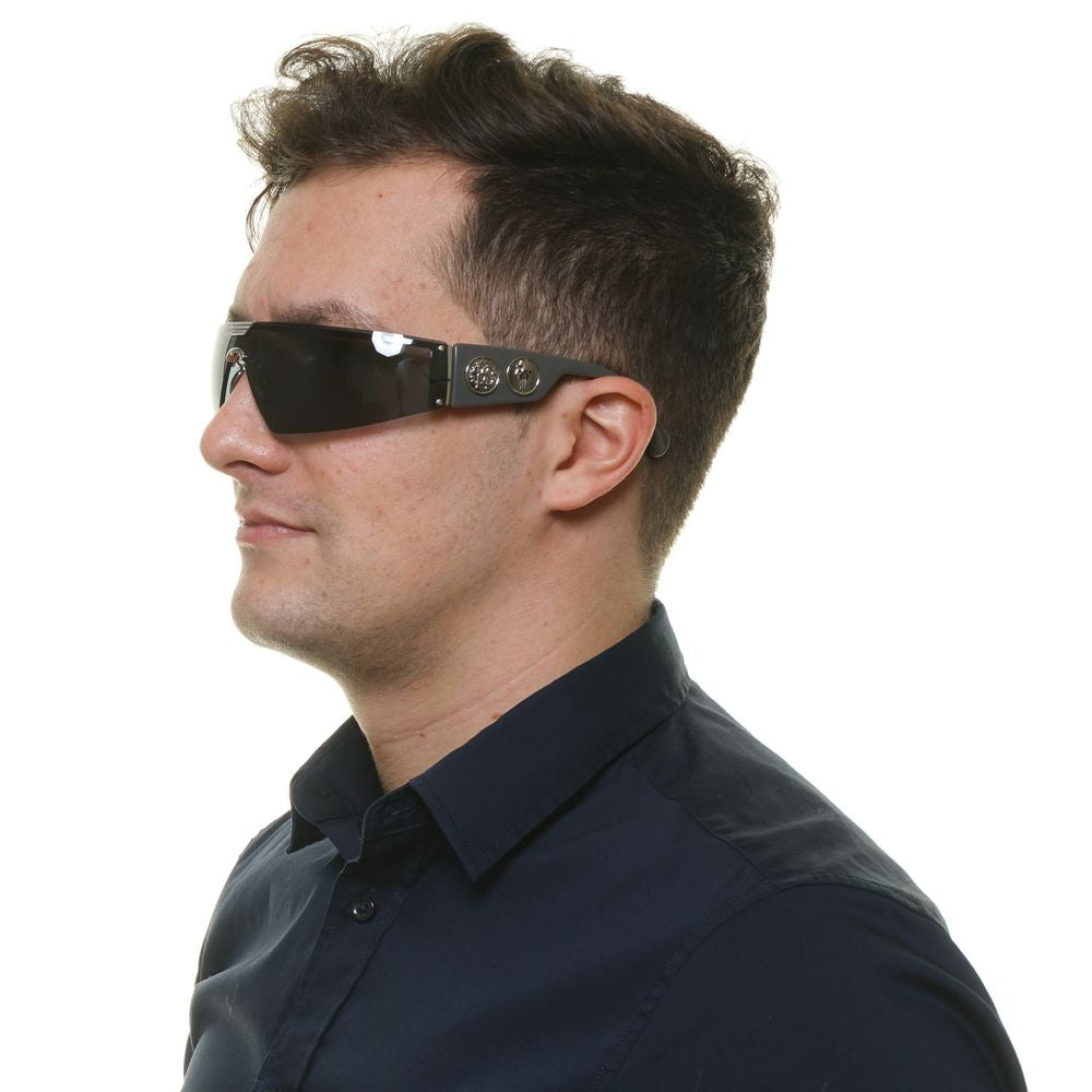 Man wearing black sunglasses with a white background