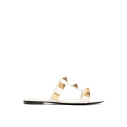 Valentino Garavani Roman Stud Leather Flat Sandals - ACCEXO