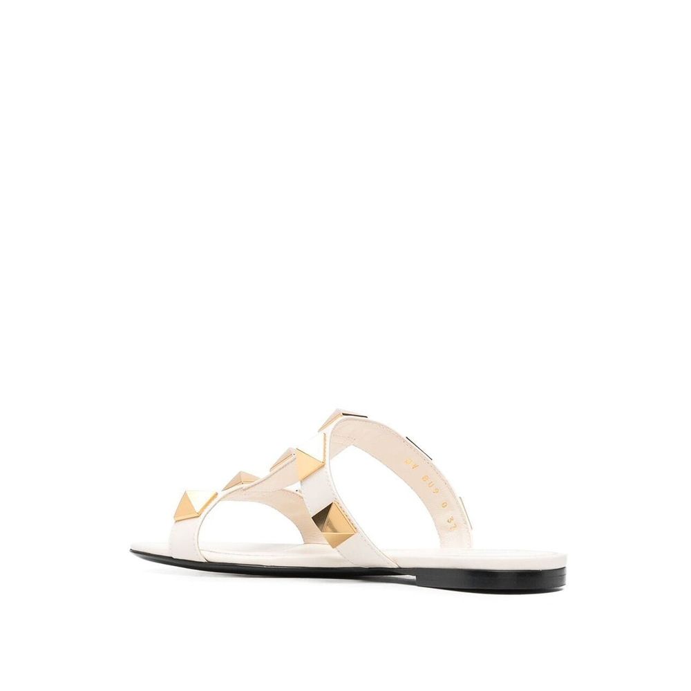 Valentino Garavani Roman Stud Leather Flat Sandals - ACCEXO