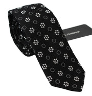 Dolce & Gabbana Elegant Black Floral Silk Necktie - ACCEXO