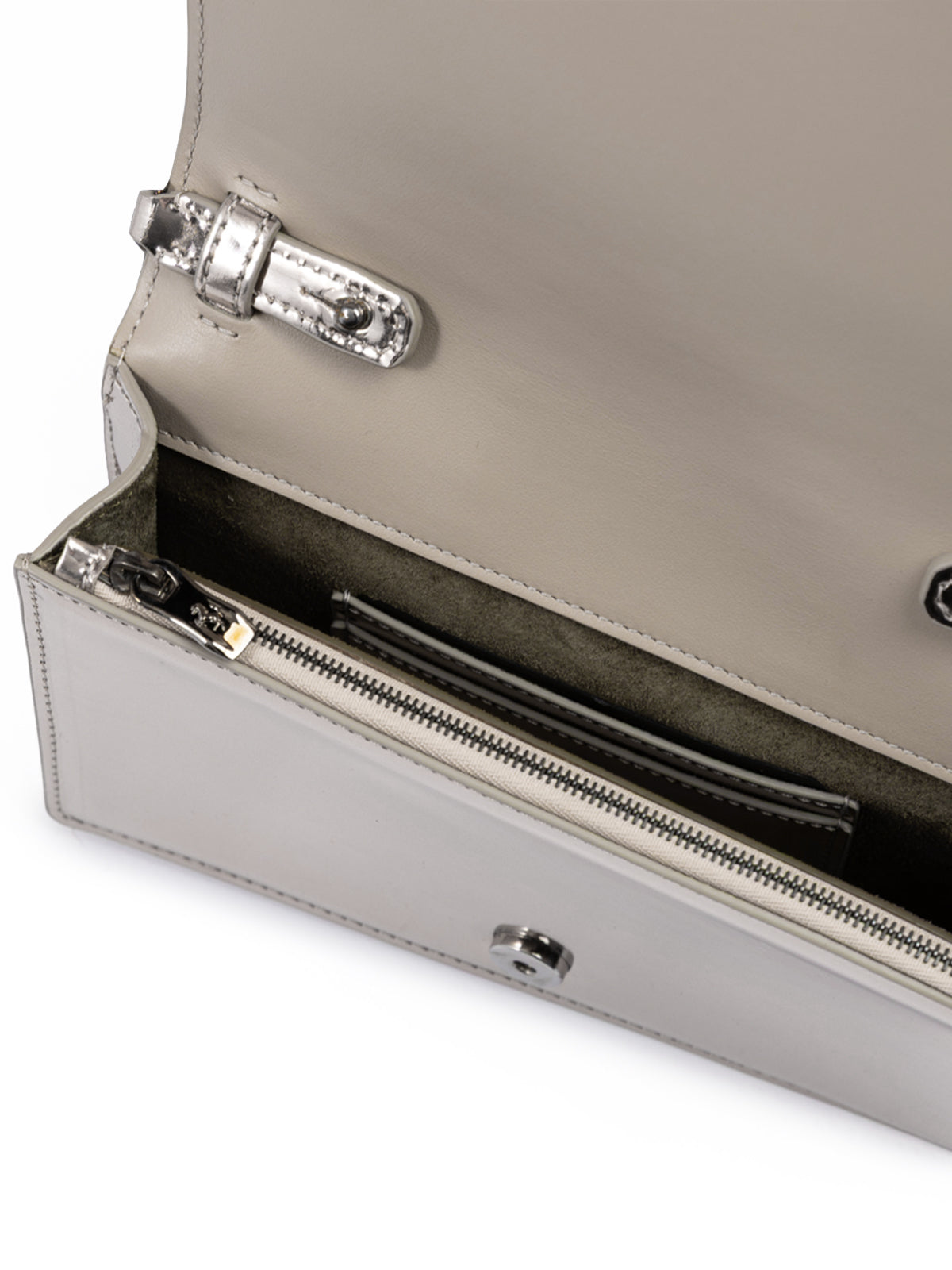 Close-up of a beige handbag with a silver clasp on a white background