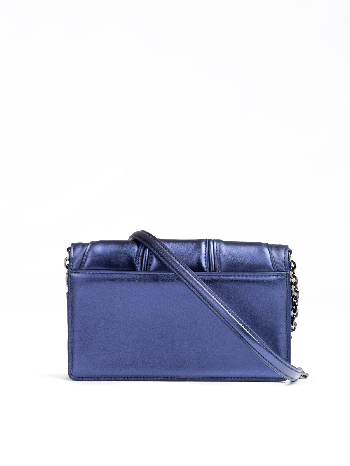 Blue handbag with a strap on a white background