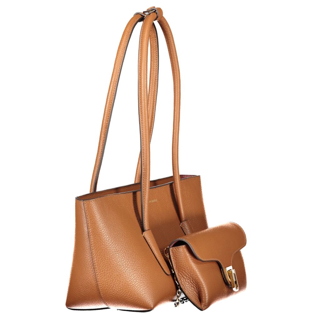 A tan pebbled leather tote bag with long shoulder straps and a matching small flap crossbody pouch with a gold-tone clasp, shown on a plain white background.